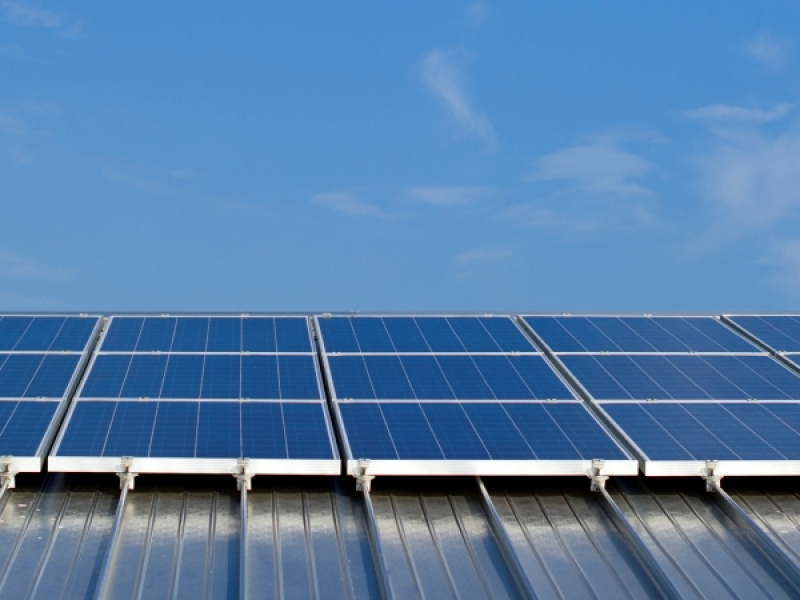 Solar panels on standing seam roof